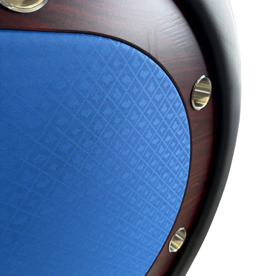 Close-up of a blue textured surface with wooden border and gold accents